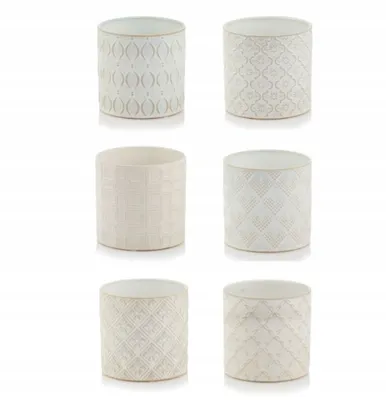 A grid of six cream-colored ceramic cylinder pots with embossed patterns.