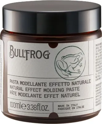 A product shot of a jar of hair paste.