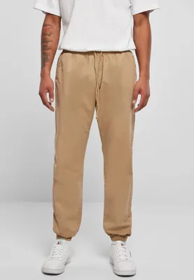 Zdjęcie produktu dla Urban Classics - Spodnie dresowe BASIC unionbeige - L