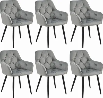 Six gray velvet dining chairs with black metal legs are arranged in two rows of three against a white background.