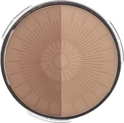 A top-down view of a round bronzing powder compact with two shades and a sunburst pattern.
