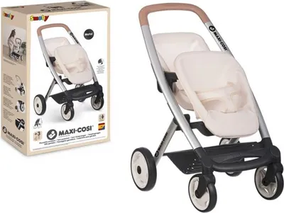 A product shot of a twin doll stroller next to its packaging.