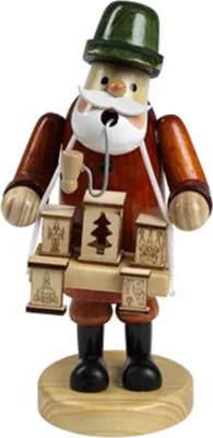 Räuchermännchen Laternenhändler mit einem grünen Hut und braunen Mantel. Er trägt einen weißen Bart.