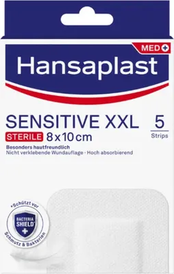 The image shows the packaging of Hansaplast Sensitive XXL sterile wound dressings.