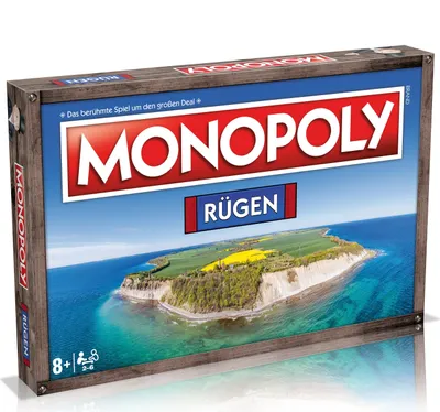 A Monopoly board game box featuring a scenic island landscape.