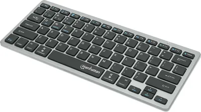 A silver and black ultra-slim keyboard is shown from a slightly elevated diagonal angle against a white background.