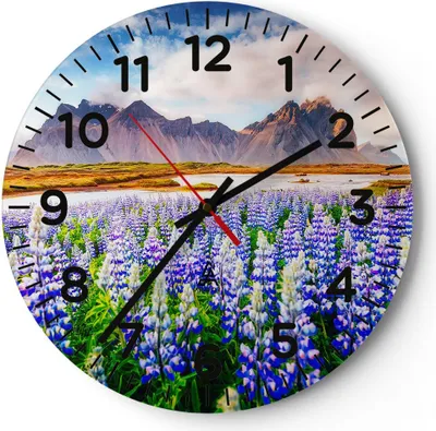 Produktbild von Wanduhr - Rund - Glasuhr - Berge Wiese Blumen - 40x40cm - Schleichendes Uhrwerk - Lautlos - zum Aufhängen bereit - Dekoration Modern - Wanddekoration aus Glas - C4AR40x40-4114