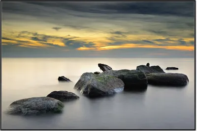 Produktbild von Wallario Wandbild Mystische Felsen im Meer, Größe: 61 x 91,50 cm, Poster mit schwarzem Aluminiumrahmen