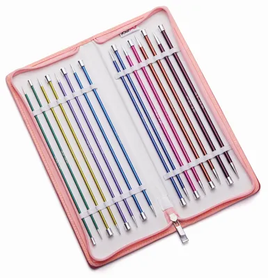 A set of knitting needles in a pink case.