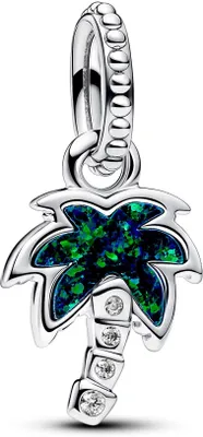 A silver charm shaped like a palm tree with green and blue iridescent inlay and clear stones on the trunk, shown against a white background.