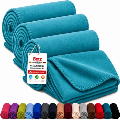 Produktbild von Betz Fleecedecke 3 Stück 130x170 cm 180g/m² – Wohndecke & Kuscheldecke – Flauschige Sofadecke als Tagesdecke – Leicht, wärmend & pflegeleicht - petrol, KI-generiertes Bild