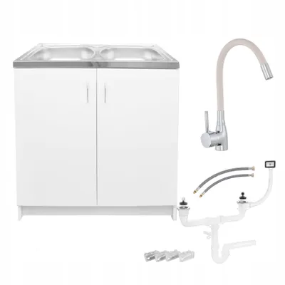 A white kitchen cabinet with a double sink and a beige flexible faucet, along with plumbing accessories, displayed against a white background.