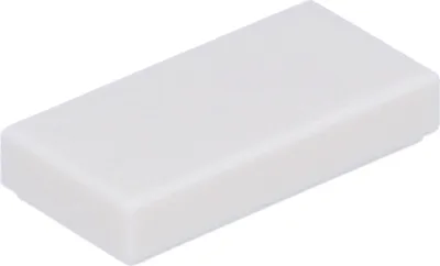A single white rectangular object, likely a LEGO brick or similar building block, is shown from a slightly elevated diagonal angle against a plain white background.