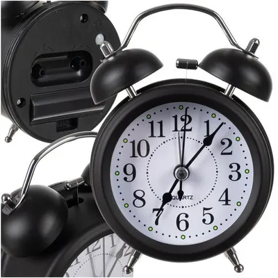 A collage of black retro alarm clocks, with a close-up of one clock face and the back of another.