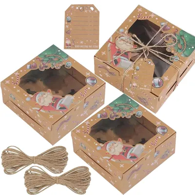 Image de 12 cupcakes de Noël présentés dans une boîte avec fenêtre