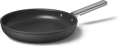 A black frying pan with a silver handle is shown against a white background.