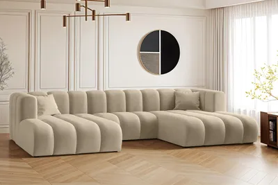 A modern living room with a large sectional sofa.