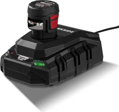A black battery charger with a battery inserted, shown from a slightly elevated angle.