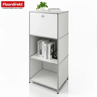 A white modular shelving unit with a closed compartment on top, an open shelf with books, and an empty open shelf below, set against a white background.