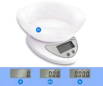 Immagine prodotto di Bilancia digitale da cucina con precisione di 1 grammo, capacità di 700 ml, display LCD, spegnimento automatico, dimensioni 11,2 cm x 5,3 cm x 17,5 cm, bilancia per alimenti