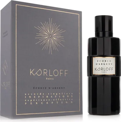 A perfume bottle and its packaging are displayed side-by-side against a white background.