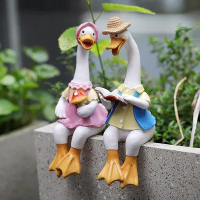 Produktbild von Gartenfiguren: Lesendes Entenpaar, Tierskulpturen, 22 cm, aus Kunstharz, für drinnen und draußen