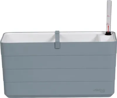A self-watering planter box with a water level indicator.