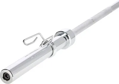 A close-up of a chrome barbell with a weight clamp attached.