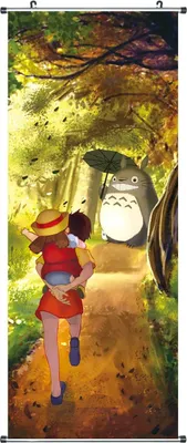 A mother carrying her child runs through a forest path towards Totoro, who is holding an umbrella.