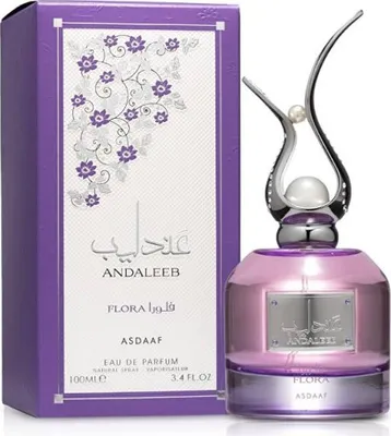 A perfume bottle and its box are displayed against a white background.