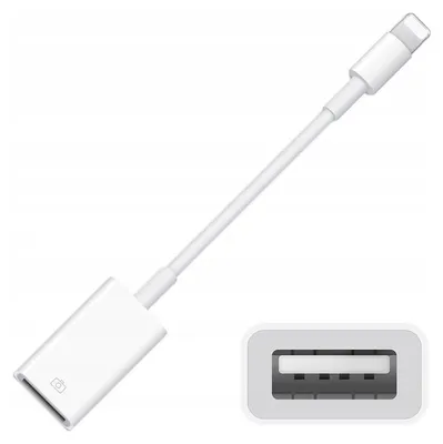 A white adapter cable with a Lightning connector on one end and a USB-A port on the other, shown against a white background. A close-up of the USB-A port is also visible.