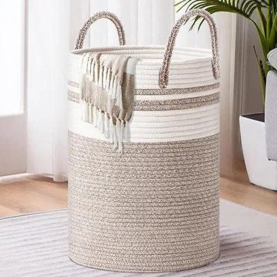 Image de Grand panier pratique pour la chambre d'enfant, muni d'une poignée, idéal pour les escaliers.
