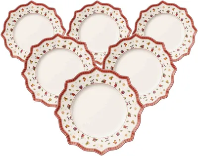 A set of six decorative plates arranged in a fan shape on a white background.