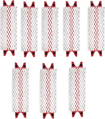 A collection of eight mop heads arranged in two rows of four.