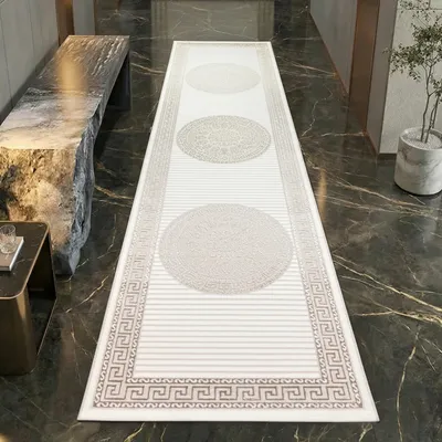 Zdjęcie produktu dla Błyszczący dywan designerski z orientalnym wzorem, w kolorach białym, beżowym i brązowym. Wymiary: 100 x 300 cm