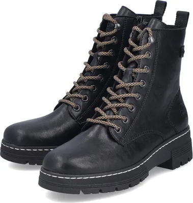 A pair of black lace-up boots on a white background.