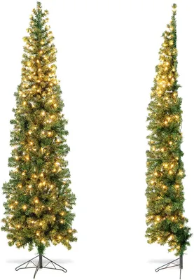 Two slim, pre-lit artificial Christmas trees stand side-by-side against a white background.