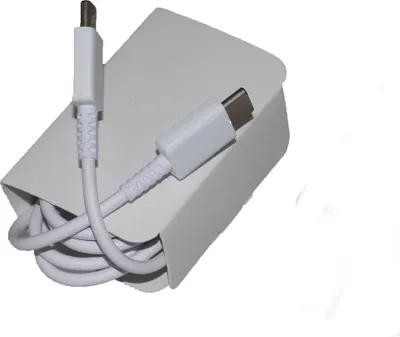 A white USB Type-C charging cable coiled inside a white cardboard holder, with the connectors visible.