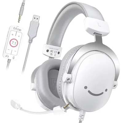 A white gaming headset with a cute smiley face design on the earcups, along with its detachable microphone and a USB control module.