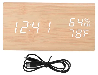 Productafbeelding van Driehoekige digitale klok van hout, met weergave van tijd, datum, temperatuur en luchtvochtigheid, alarmfunctie, spraakbesturing en LED-verlichting in hout