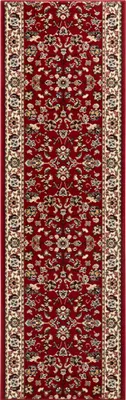 A close-up, full-length view of a red runner rug with a traditional floral pattern.