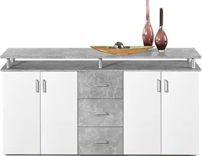 A sideboard with white doors and gray drawer fronts, decorated with vases and a bowl on top.