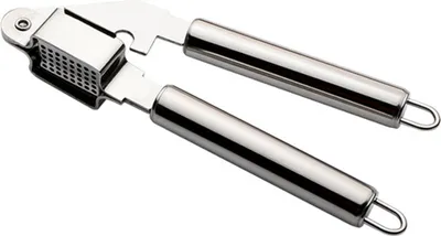 A stainless steel garlic press on a white background.