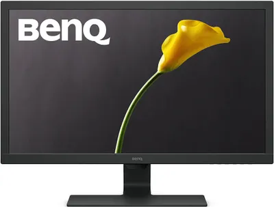 A BenQ monitor displaying a yellow calla lily against a dark gray background.