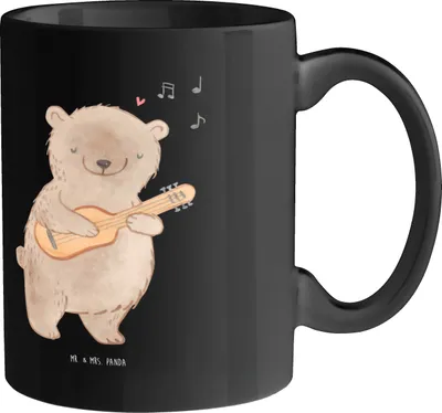 Produktbild von Mr. & Mrs. Panda Kaffeebecher Charisma Gitarre - Schwarz - Geschenk, Tasse, Teetasse, Musik, Instrument, Lernen, Kaffeetasse, Abenteuer, Becher, Musiker, Akustik, Liebe