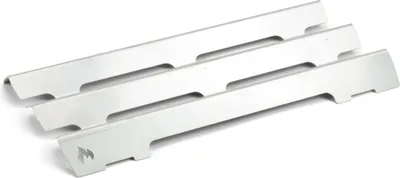 Three metal grill heat shields are arranged diagonally on a white background.