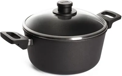 A black cooking pot with a glass lid and handles, shown from a side angle on a white background.