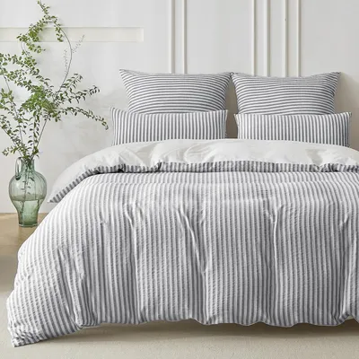 Immagine prodotto di Set di lenzuola 135x200 cm, 4 pezzi, in cotone jacquard, colore blu-grigio e bianco