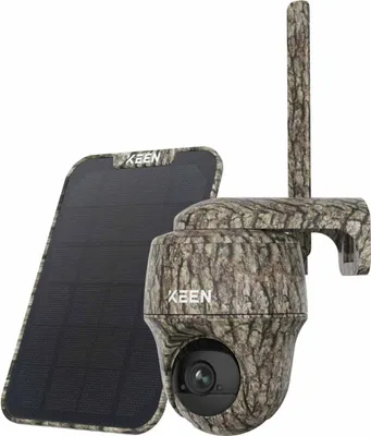 A camouflage-patterned security camera with a solar panel.