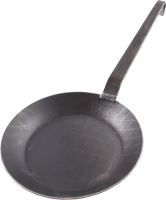 A close-up studio shot of a single metal frying pan.